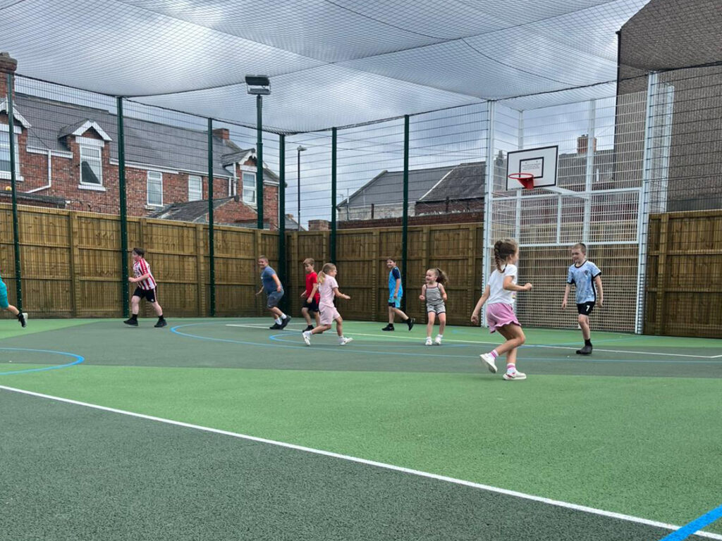 playzone y people on multi use games court 4 3 crop